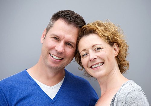 A couple smiling