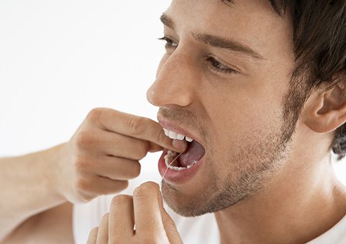 A man flossing